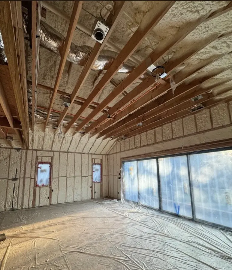 Interior walls and ceiling insulated with spray foam during new construction in South Brooksville